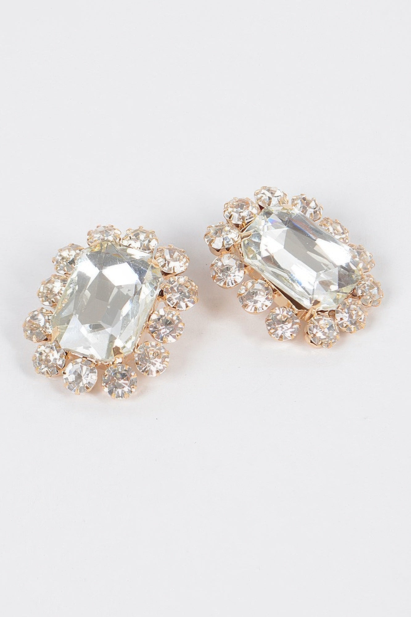 Clear big stone stud earrings.
