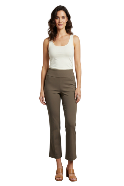 A woman posing in woodchip-colored pull-on pants.