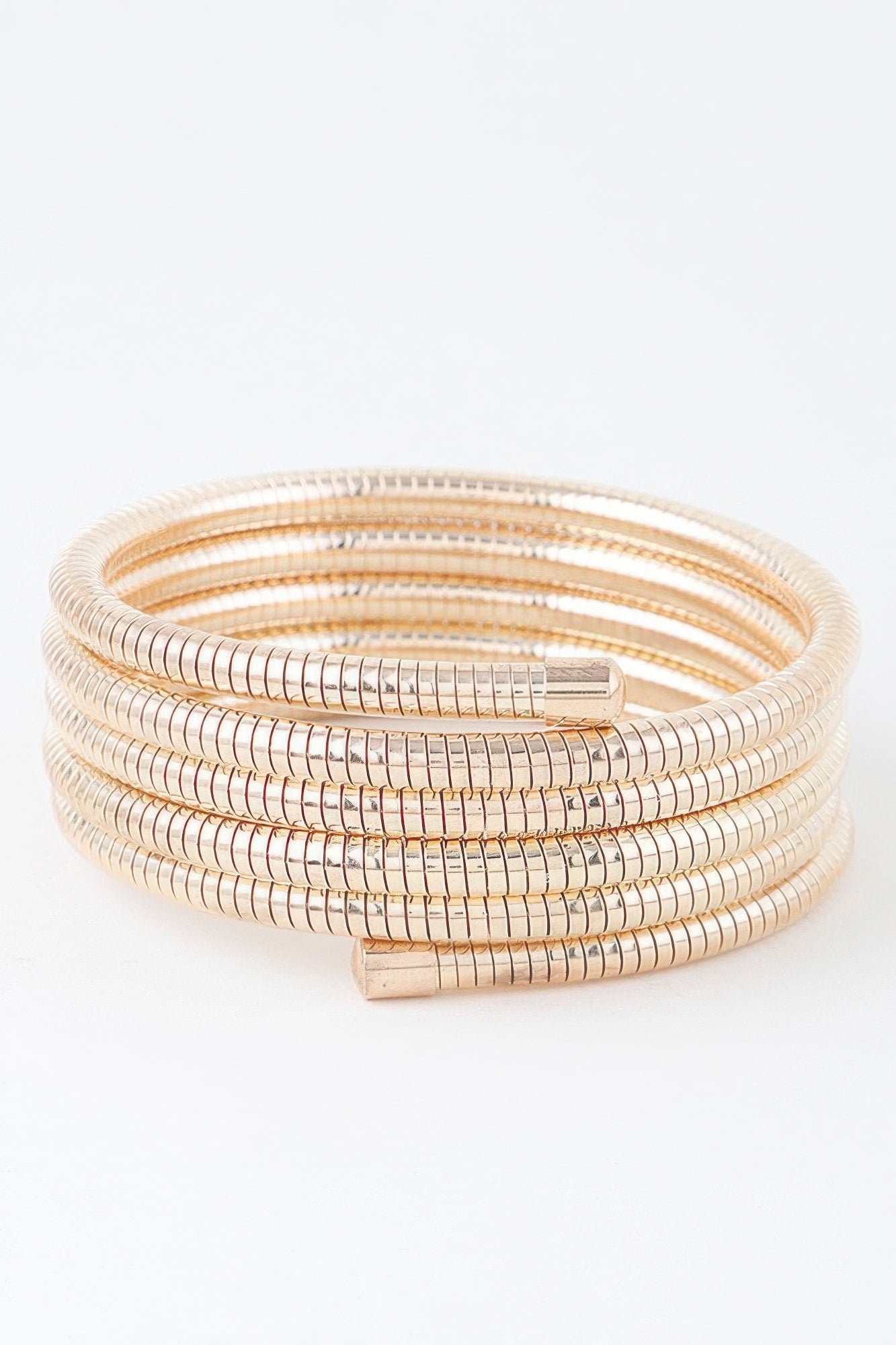 A gold snake chain wrap bracelet.