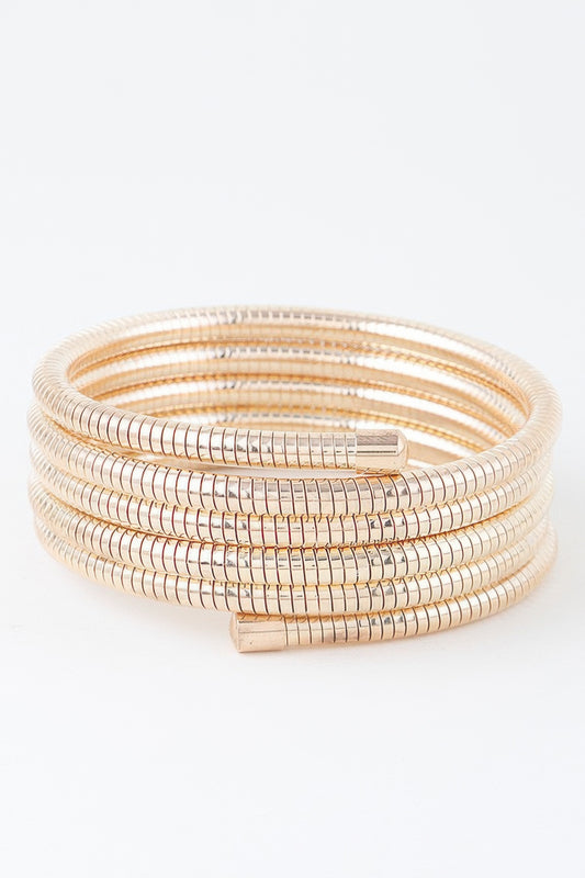 A gold snake chain wrap bracelet.